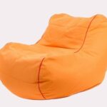 Upholstered polyester armchair with removable cover