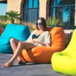 Upholstered polyester armchair with removable cover - Image 5